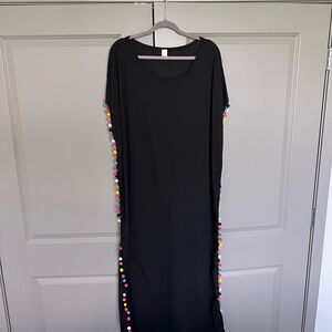 Black Dress with Colorful Pom-Pom Accents